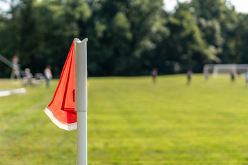 artificial,athletics,background,ball,boundaries,college soccer,competition,corner,corner flag,corner kick,cup,detail,exercise,field,field lines,flag,football,game,goal,grass,green,ground,kick,lawn,lin