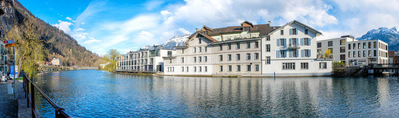 Fototapeta na wymiar Panoramic view of Interlaken West and the Aare river