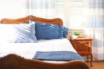 Master bedroom decor in gray, white and blue palette