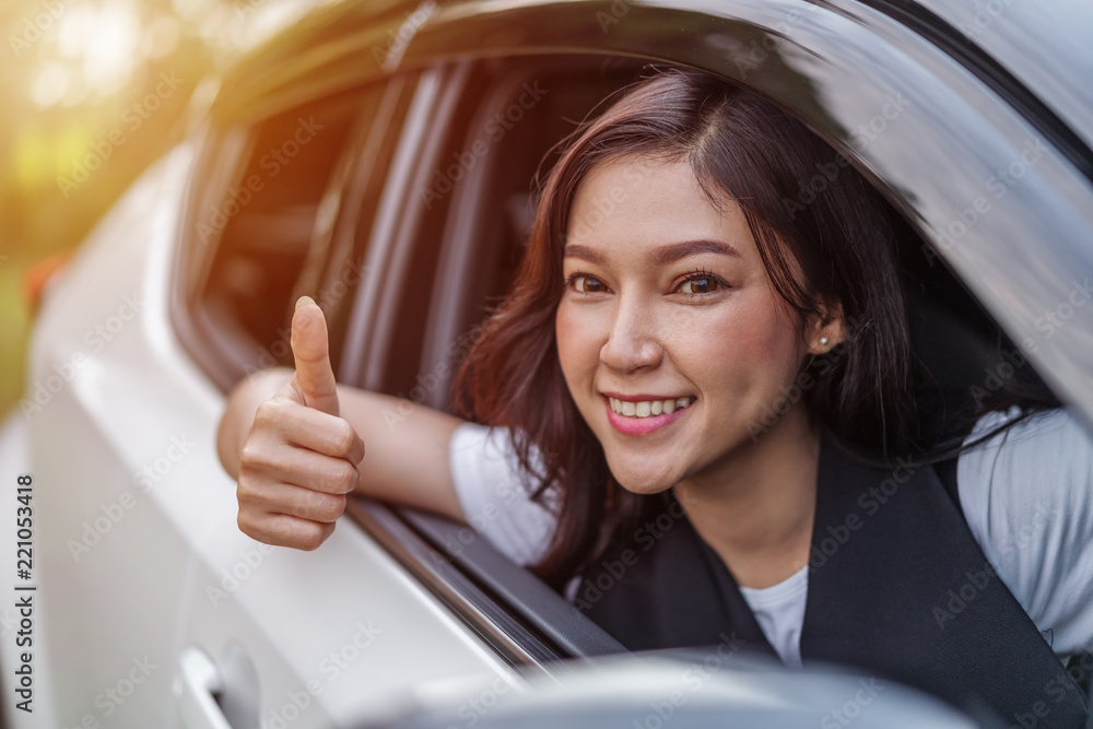 Sticker woman giving thumb up inside her car