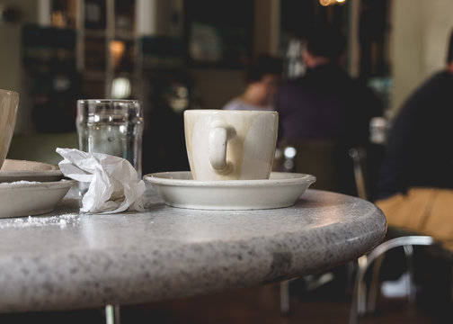 Used Dirty Coffee Cup And Water Glass In A Cafe Diner