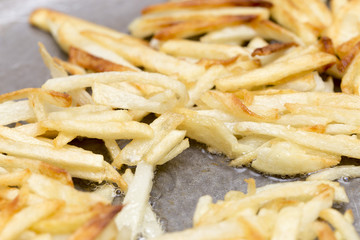 French fries fried in a pan