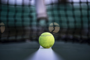 The beginning of a champion, Close up tennis ball on the courts background.