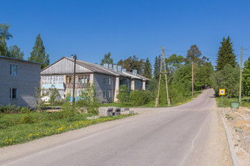 Fototapeta na wymiar View of the street in the village of Ruskeala