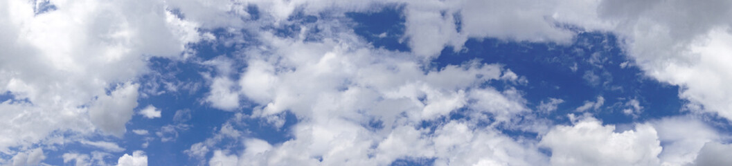 Panorama Beautiful white clouds, blue sky and cloud  on background, with copy space for your text..