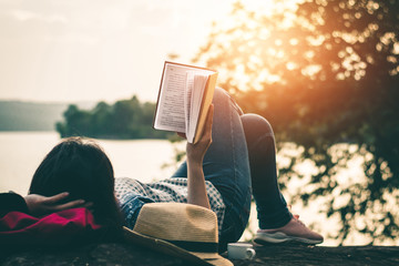 Women read books in quiet nature, concept read a books.