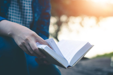 Women read books in quiet nature, concept read a books.