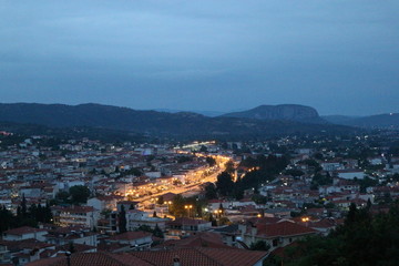 Evening view of light river in Kalabaka city, Meteora, Greece