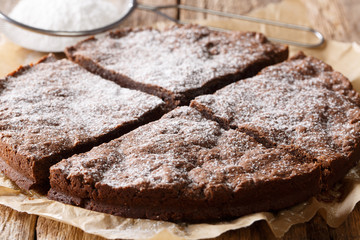 Homemade Swedish chocolate sticky cake close-up on a table. horizontal