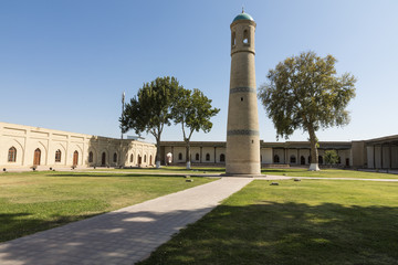 Fototapeta premium The architectural ensemble of the Jami (Friday) Mosque includes the minaret in the middle of the garden in Kokand.