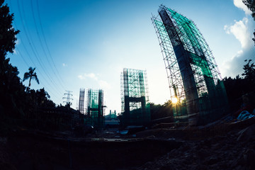 Construction site of a highway bridge in the sunrise