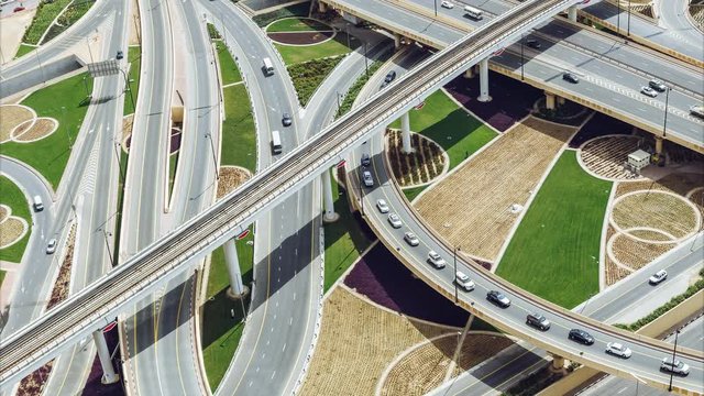 Aerial view on big highway interchange with traffic in Dubai, UAE 