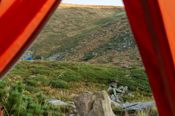 View from tent. Camping. Mountain landscape.