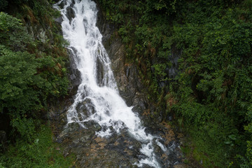 Aerial View of Waterfall in the Tropical Rainforest Mountains