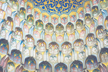 Obraz na płótnie Canvas Decorative patterns and architectural details at the main entrance of Abdullaziz Khan madrasah in Bukhara, Uzbekistan