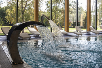 Obraz na płótnie Canvas SPA swimming pool in hotel or spa center