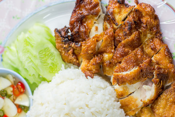Fried Chicken and Rice in Plate on Wooden Floor ,fast food,in thailand