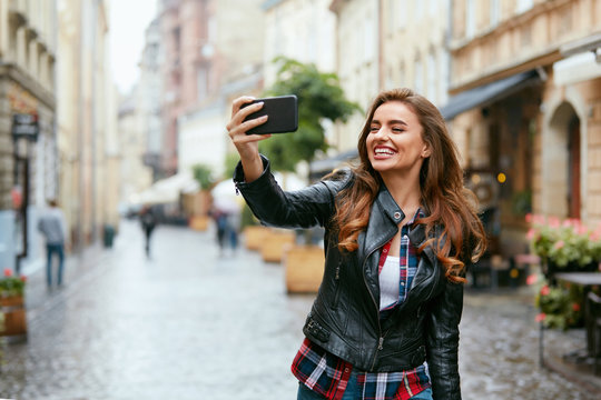 Woman Video Calling On Phone On Street, Taking Photos 