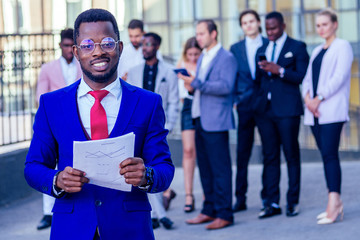 Successful multinational professionals team portrait, multi-ethnic group of confident business...