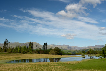 Fototapeta na wymiar View of central fells over Wise Een Tarn on Claife Heights, Lake District