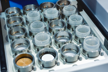 Tray with metal rings, a fragment of laboratory equipment