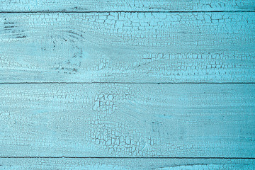 Blue horizontal wooden background with cracks
