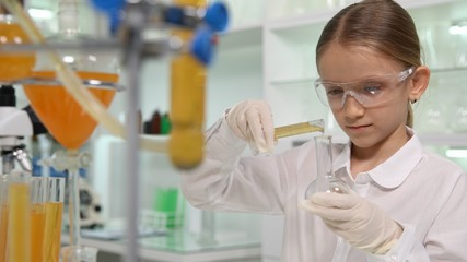 Child Making Chemical Experiment in School Lab, Student Girl in Science Class