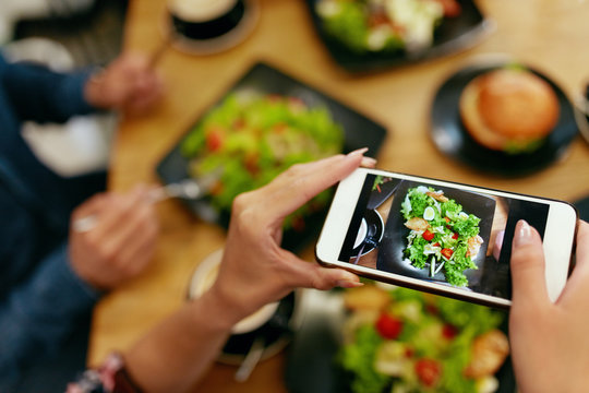 Photo On Phone. Closeup Woman Hands Photographing Food