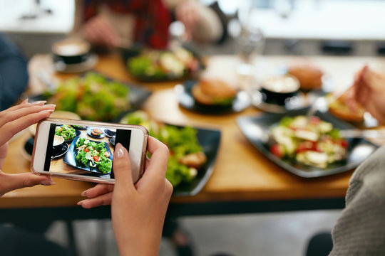 Photo On Phone. Closeup Woman Hands Photographing Food