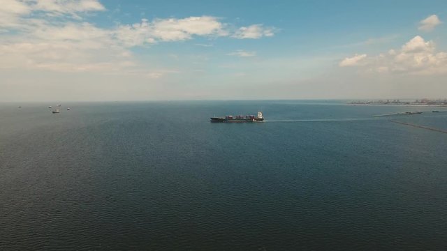 aerial footage freight and merchant ships in bay Manila container ship in sea Philippines