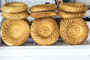 Traditional uzbekistan bread lavash at local bazaar, is a soft flat-bread of Middle Asia (Uzbekistan).
