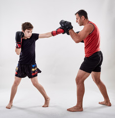 Kickboxer kid and his coach