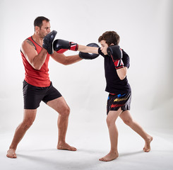 Kickboxer kid and his coach