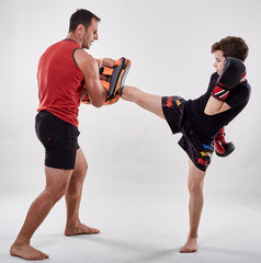 Kickboxer kid and his coach