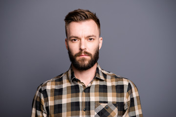 Fototapeta premium Portrait of attractive, good-looking handsome man in brown check
