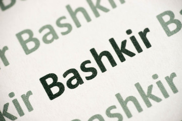 word Bashkir language printed on paper macro