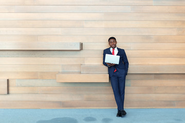 smart african business man using laptop in office.