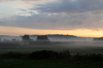 Landscape in morning fog.