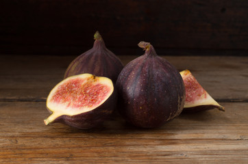 Ripe figs on old wooden table