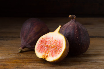 Ripe figs on old wooden table