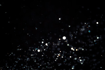 Black bokeh texture on black