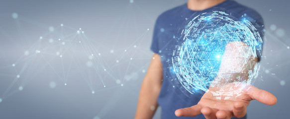 Businessman using digital triangle exploding sphere hologram 3D rendering