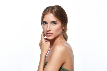 Fototapeta premium Beautiful face woman with healthy clean skin and natural makeup isolated on white
