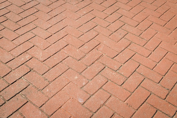 Fototapeta premium Wzór tekstury bloku czerwonej cegły na chodniku