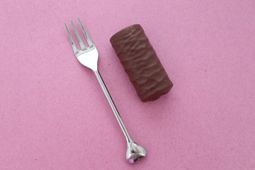 silver fork with heart shape end .love cake