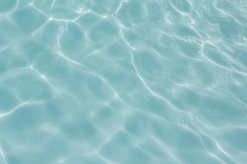 light blue water  texture pattern in swimming pool