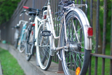 Fototapeta na wymiar Bikes on fence