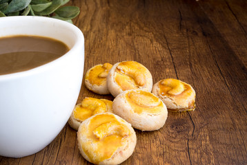 Homemade Cashew nuts  cookie, Singapore Cookies, Eat with hot Coffee on wooden background