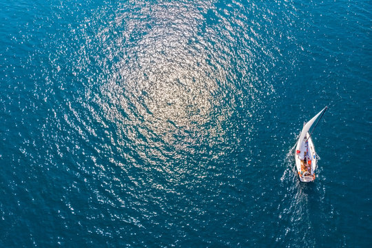 Top View Of A Sailing Yacht In The Sea