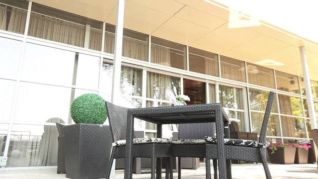 Table in the fashion restaurant, outdoor table, modern building